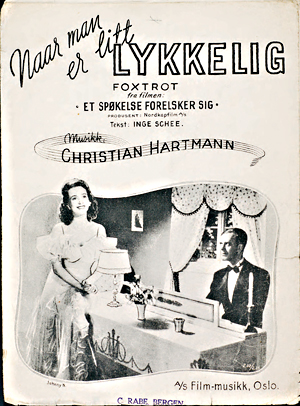 Christian Hartmann skrev melodier til en mengde norske filmer, men også enkeltstående filmmelodier. Her er Per Aabel og Wenche Foss fra ''Et spøkelse forelsker seg ''med sangen «Naar man er litt lykkelig»
